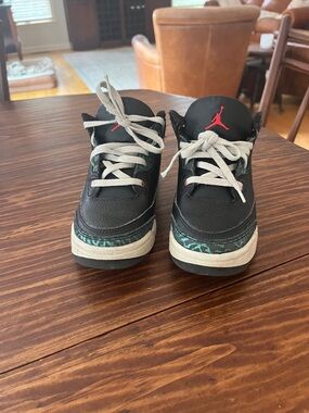 Jordan Kids Black Sneakers with Teal Accent and Red Jumpman